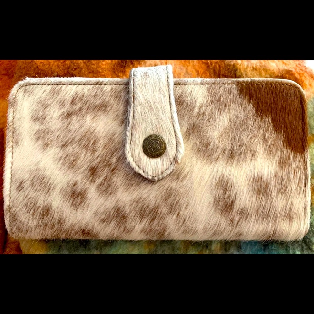Myra Hair on hide wallet